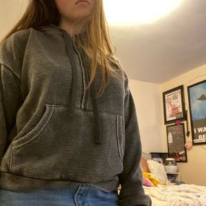 Grey worn oversized sweatshirt